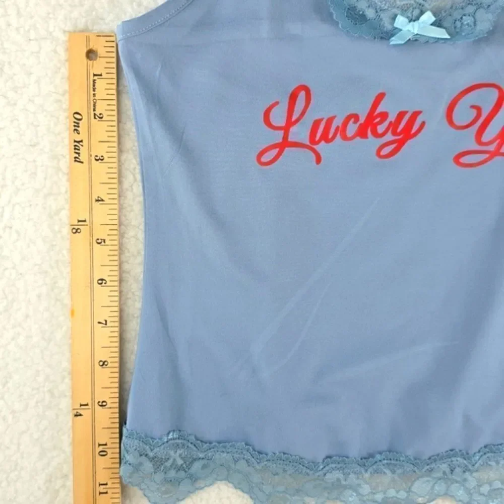 Virghoes Powder Blue Lacy Cami with red text printed Lucky You